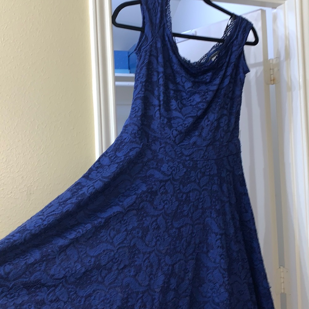 Used but still gorgeous blue floral dress. Fits in all the right places!